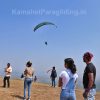 Tandem paragliding participants waiting for flight